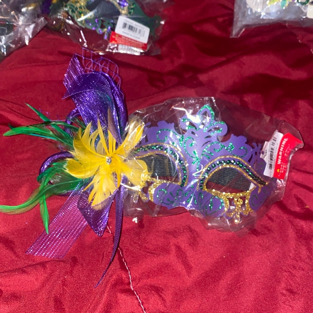 Glittered and ribboned pretty Mardi Gras mask!
